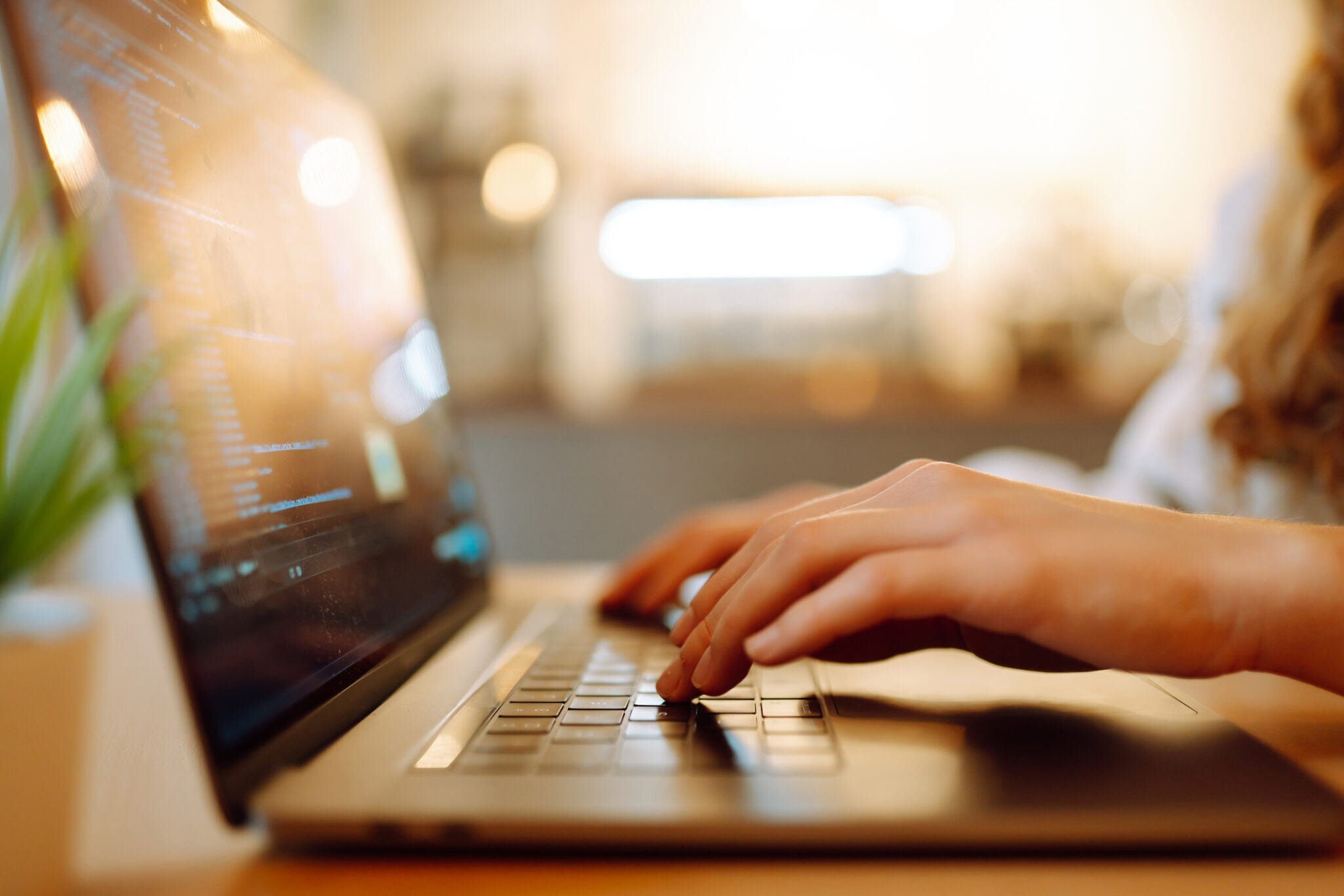 iStock-1457905152-typing-on-laptop